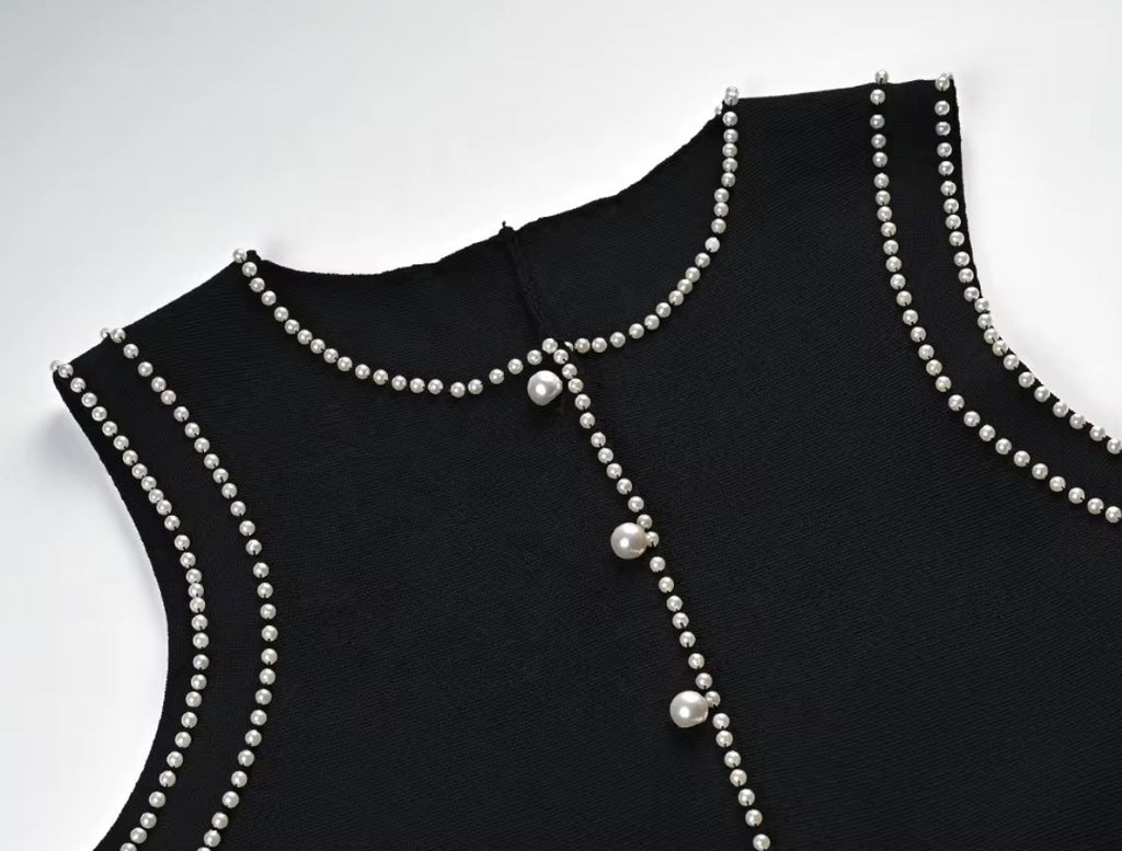 VESTIDO CON APLICACIÓN DE PERLAS